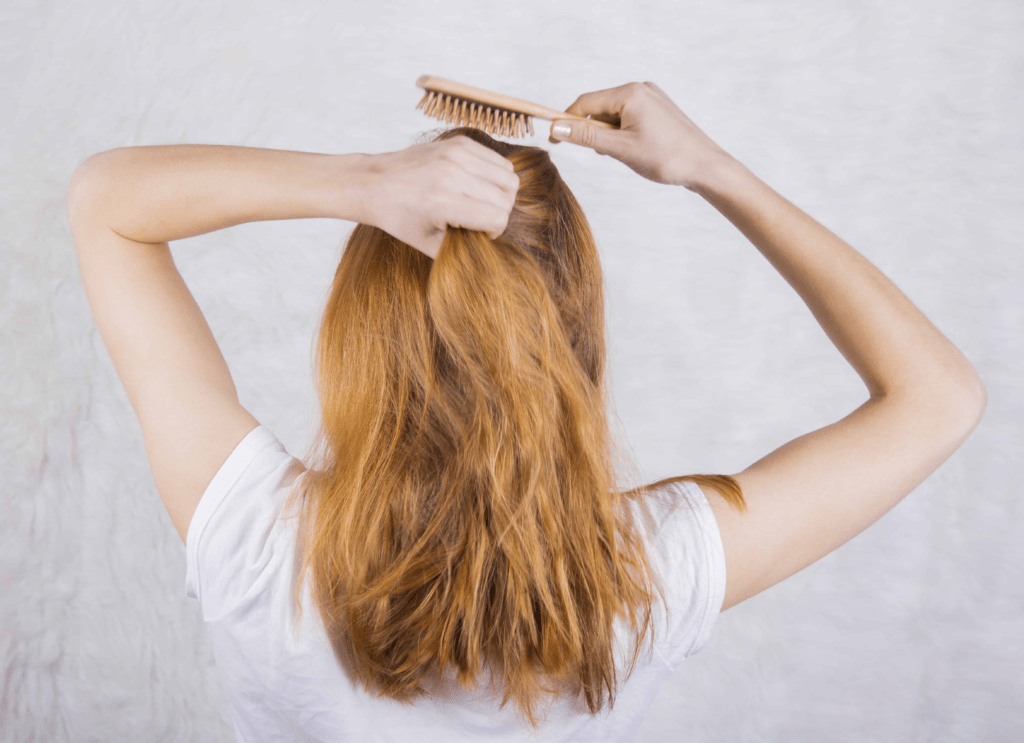 combing hair 